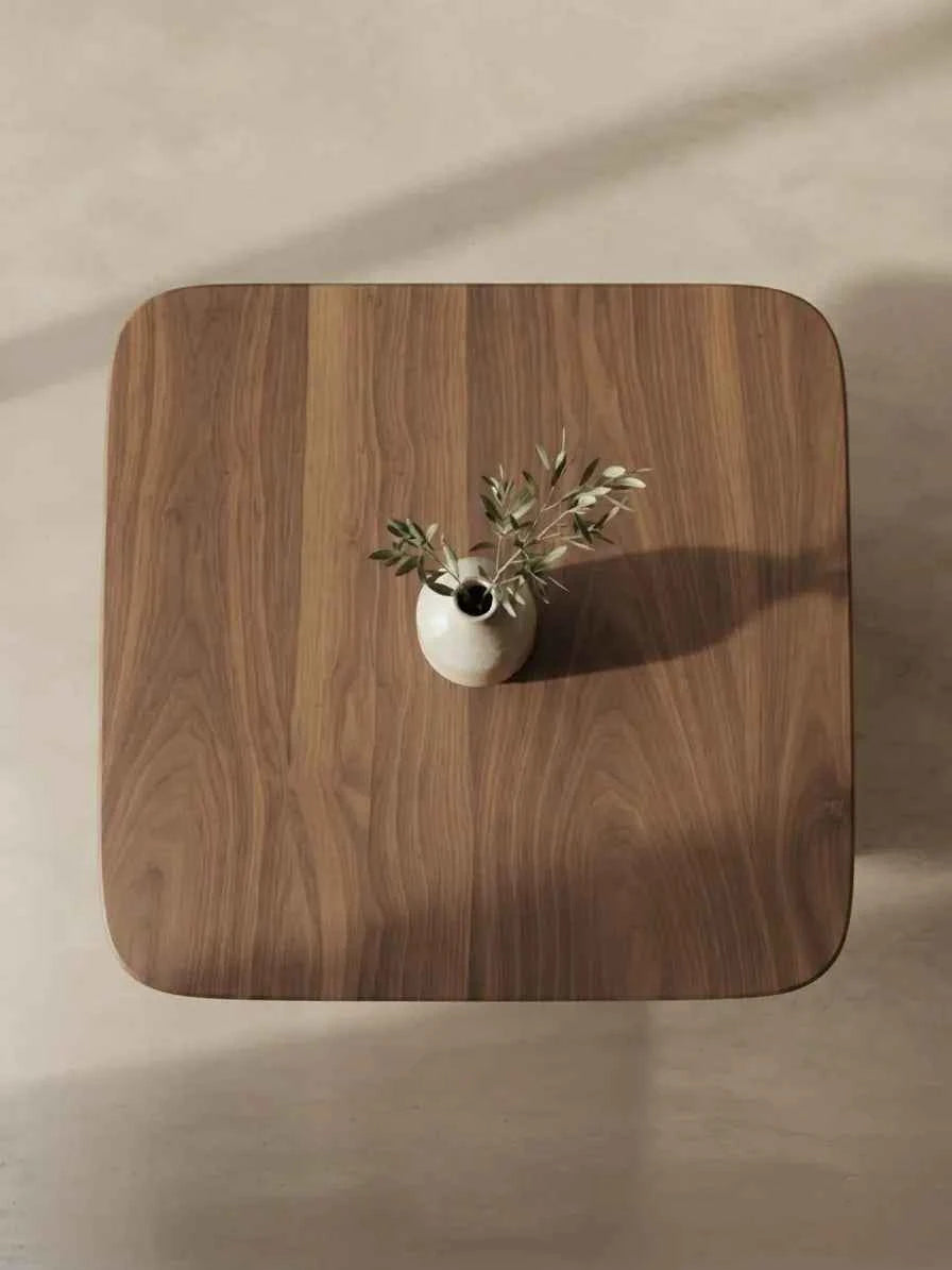 Wooden coffee table in an outdoor setting